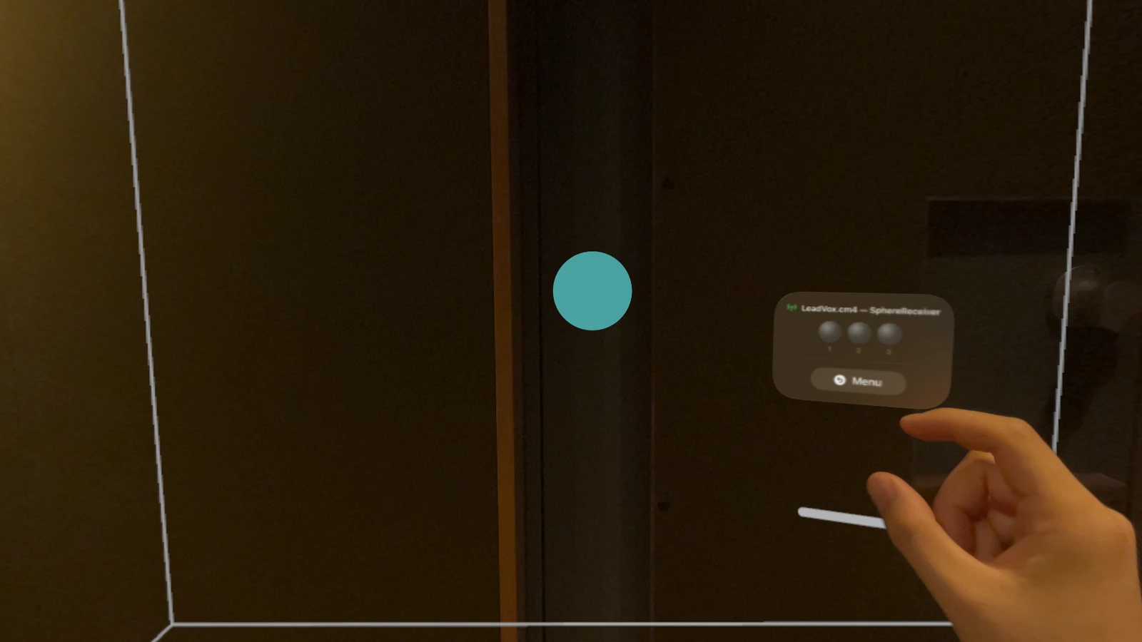 A cyan sphere appears in front of you. That is the sound itself.